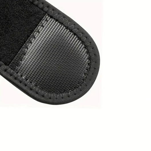 Nærbillede af skulderstøttens åndbare mesh-materiale og neoprenoverflade med syet kant