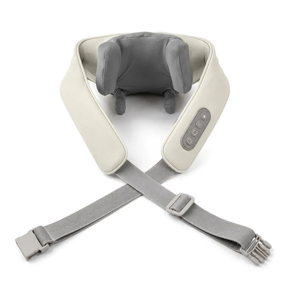 Nakkemassageapparat i beige med justerbare stropper og kontrolpanel, set lige oppefra