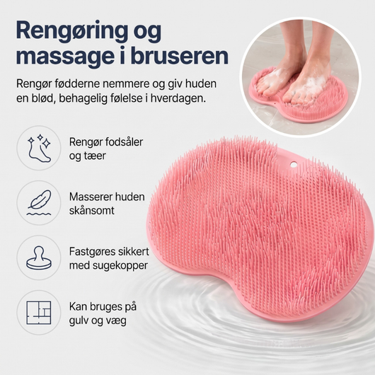 Lyserød skrubbemåtte i silikone til brusebadet. Renser fodsåler og tæer, masserer huden skånsomt, sidder sikkert fast med sugekopper og kan bruges både på gulv og væg.